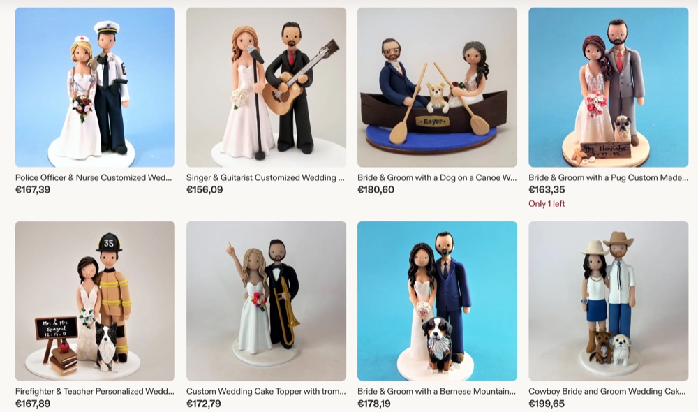 A grid of marketplace custom wedding cake toppers priced between roughly 150 and 200 euros.